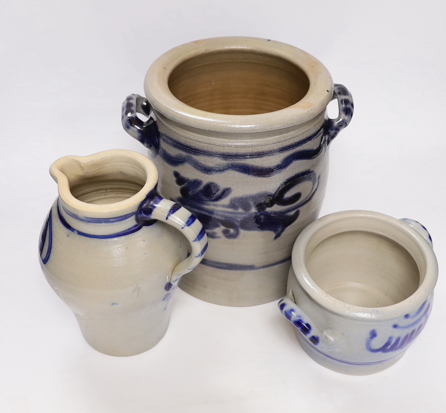 Three 19th century German saltglaze vessels, 23cm